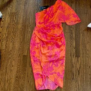 Adorable Do+Be dress. Size medium. One shoulder. Never worn. New with tags.